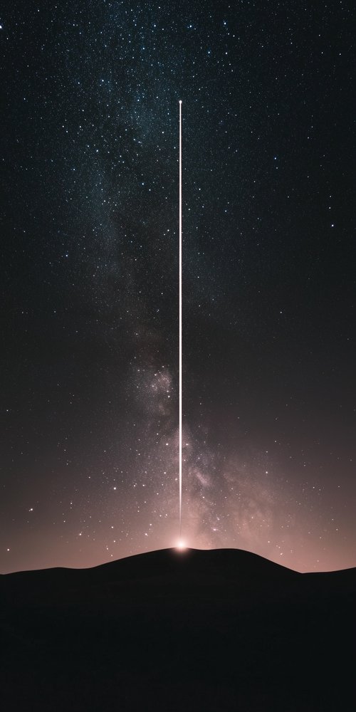Starry sky with light beam wallpaper