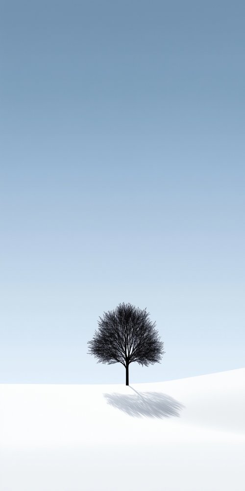 Tree on snowy landscape wallpaper
