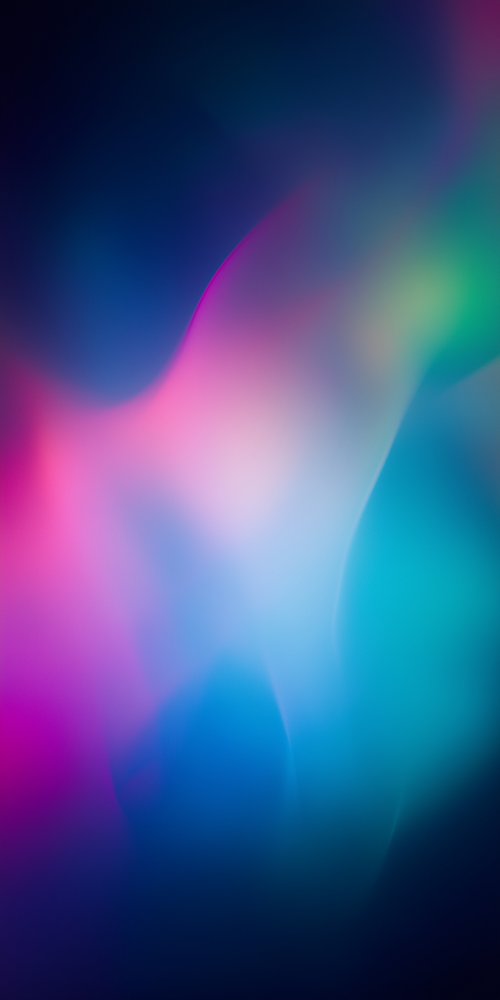 An abstract blurred gradient of colors wallpaper