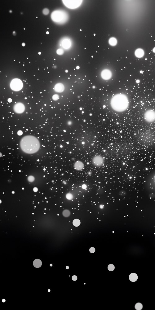 A black and white background with snow flakes wallpaper