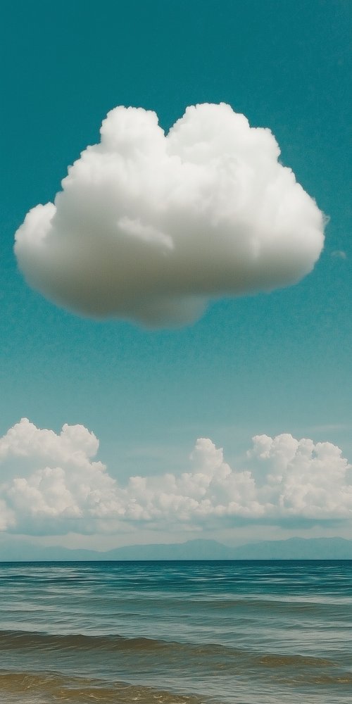 A cloud is floating in the ocean wallpaper