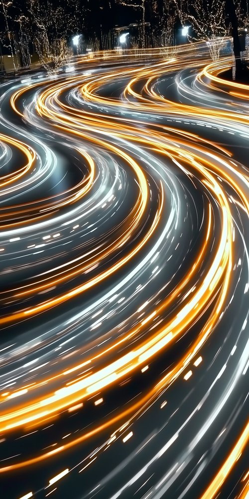 A long exposure of a highway with light trails wallpaper