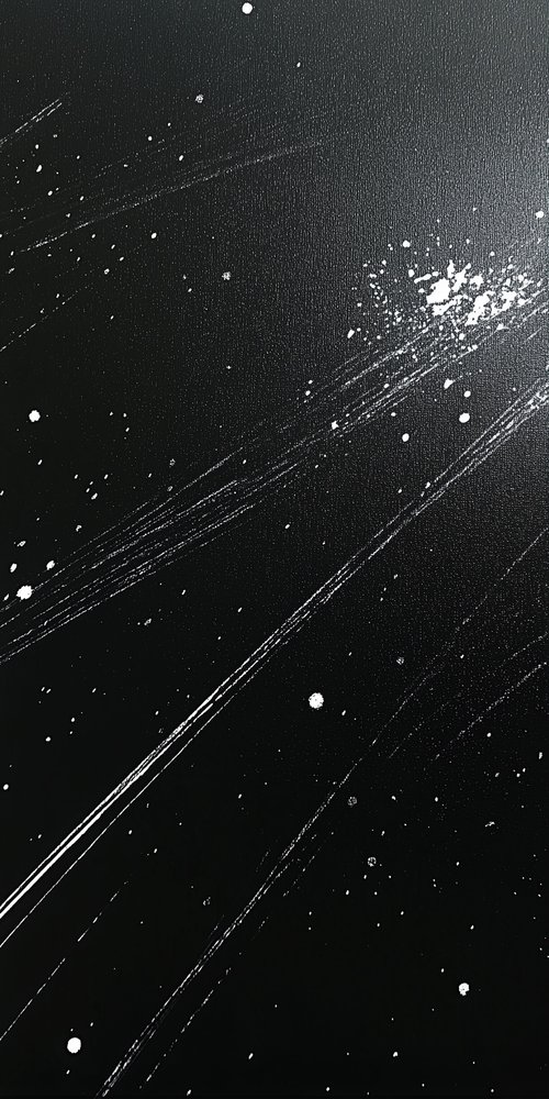 A black surface with white spots wallpaper