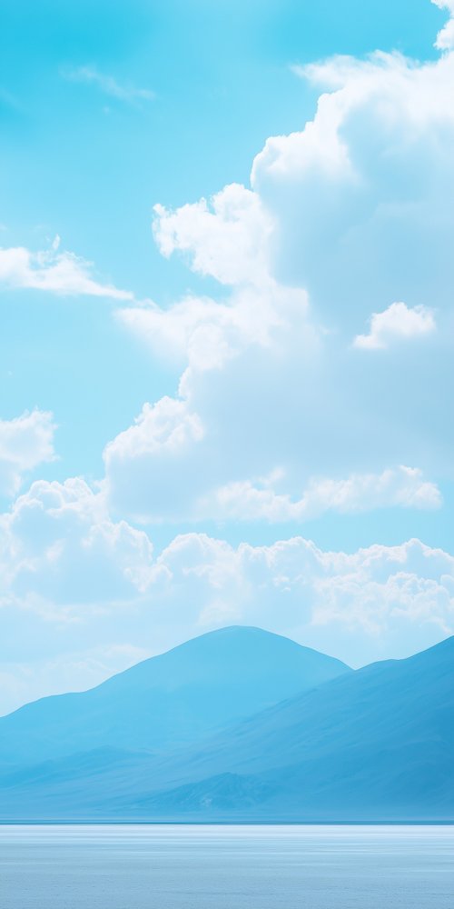 Blue mountains and cloudy sky wallpaper