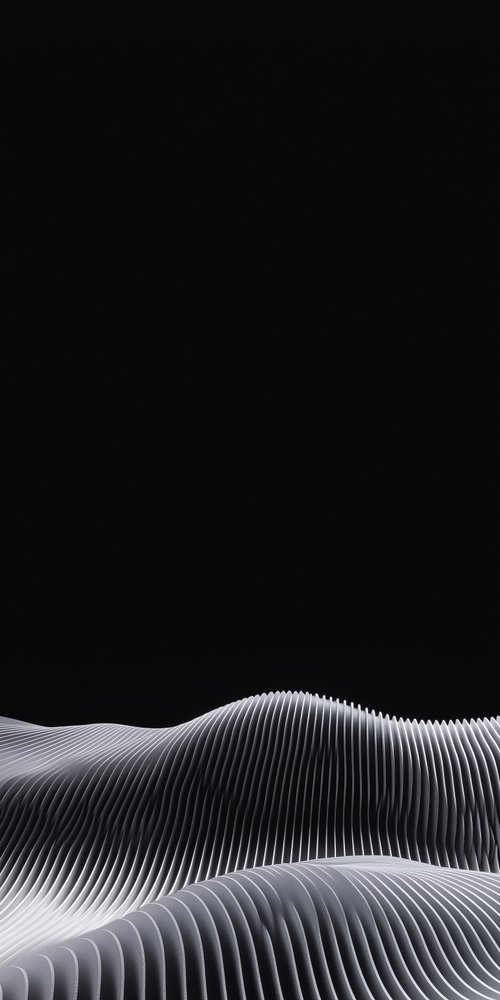 A black and white photo of a wave wallpaper