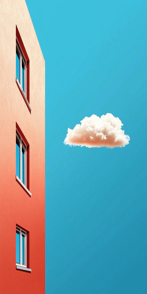 A red building with a cloud in the sky wallpaper