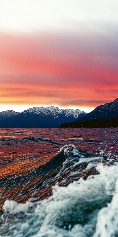 A view of a mountain range from a boat wallpaper