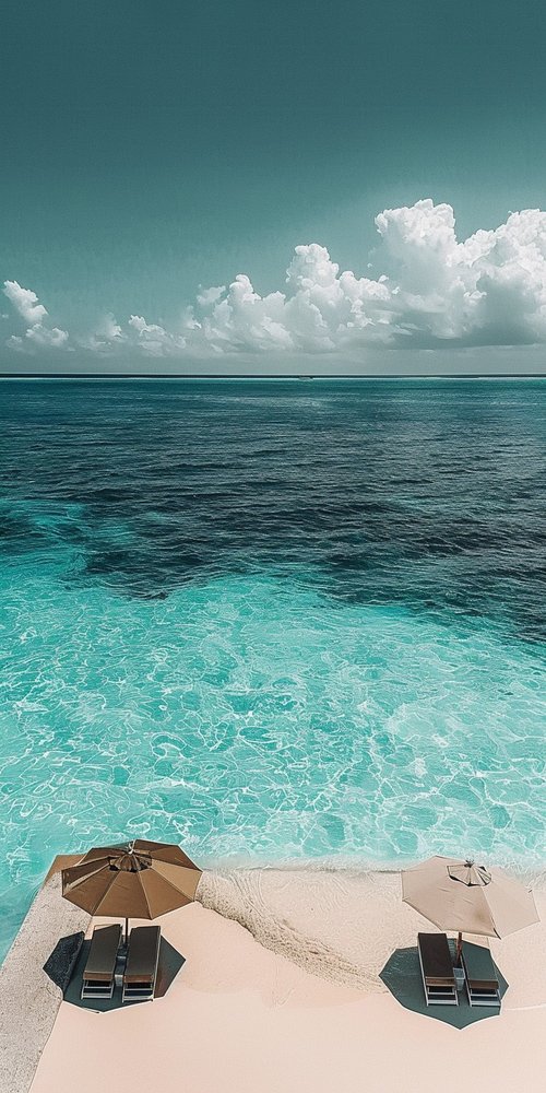 Beach chairs and umbrellas ocean wallpaper